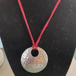 Sterling disc and leather necklace